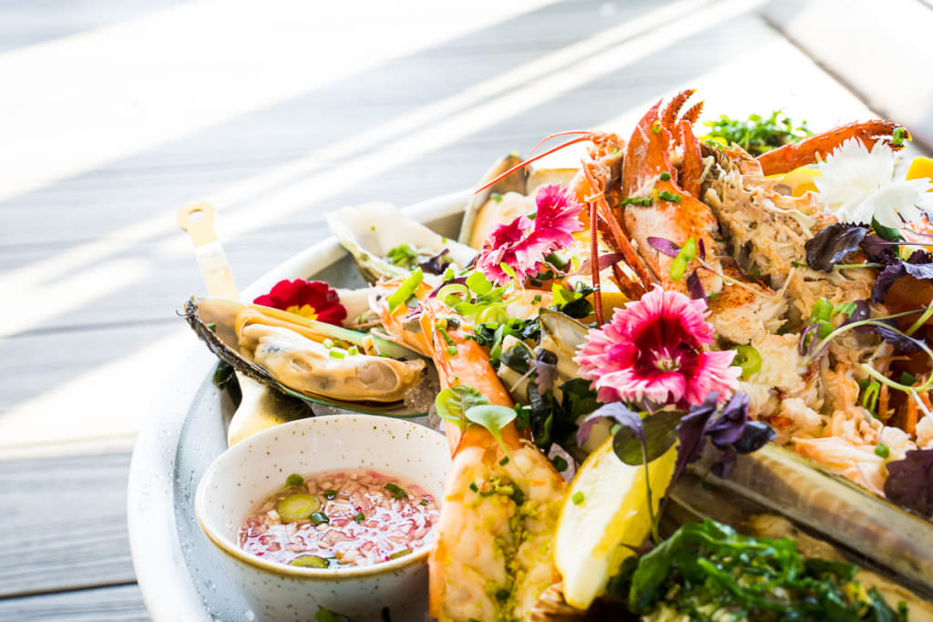 Summery image of a seafood platter on a silver dish taken for a food photography shoot in Brighton